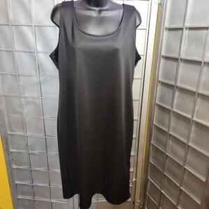 Bold elements cut to curve XL black dress